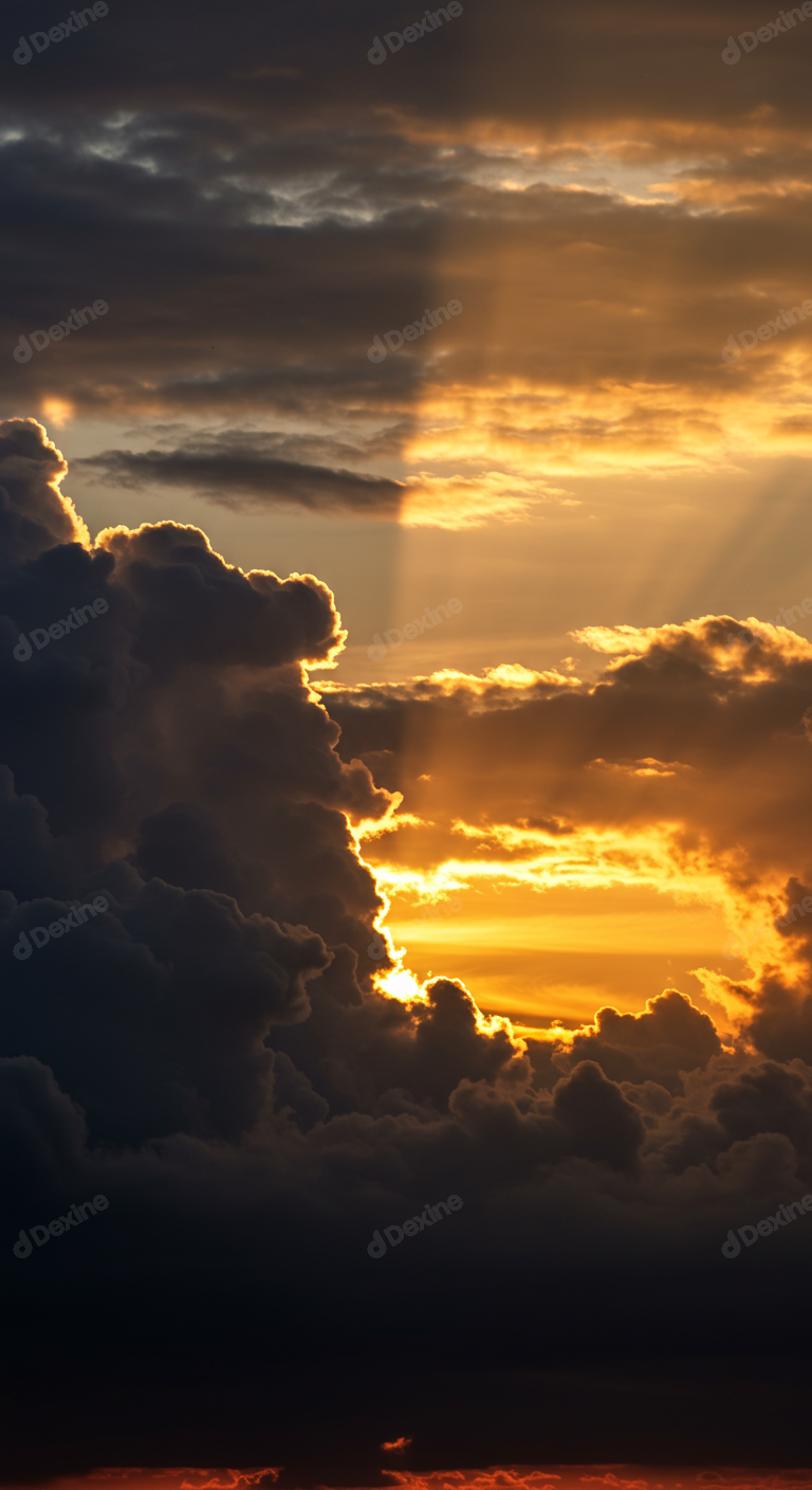 Dramatic Golden Sunset Sky With Sun Rays Through Stormy Clouds