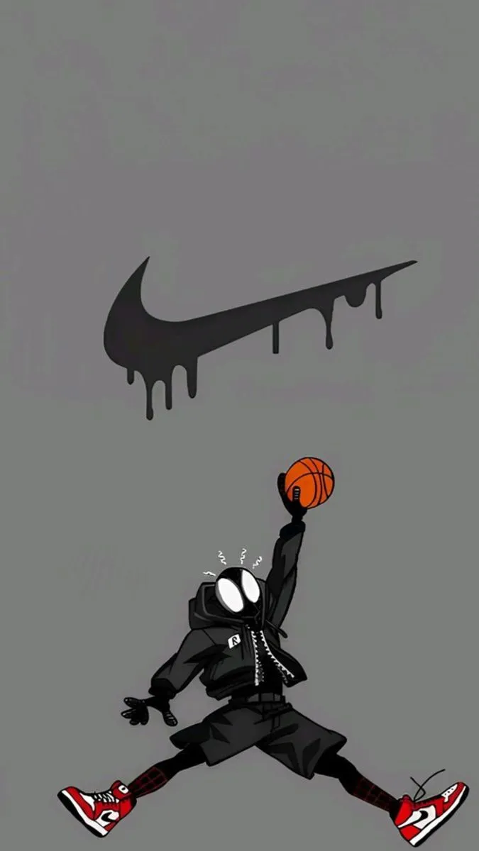 a man holding a basketball in his right hand and dripping paint on the wall behind him