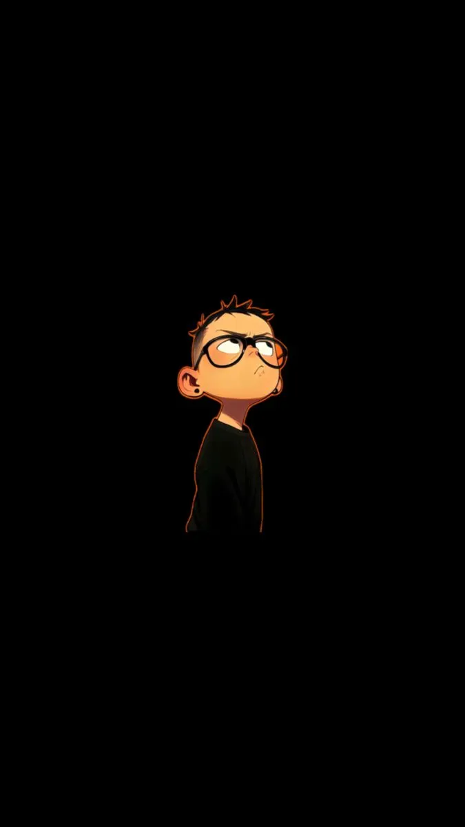 a boy with glasses looking up in the dark