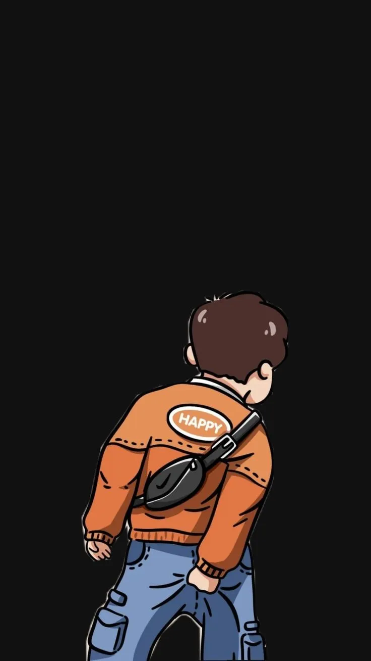 a boy in an orange jacket is holding a black object with the words happy on it