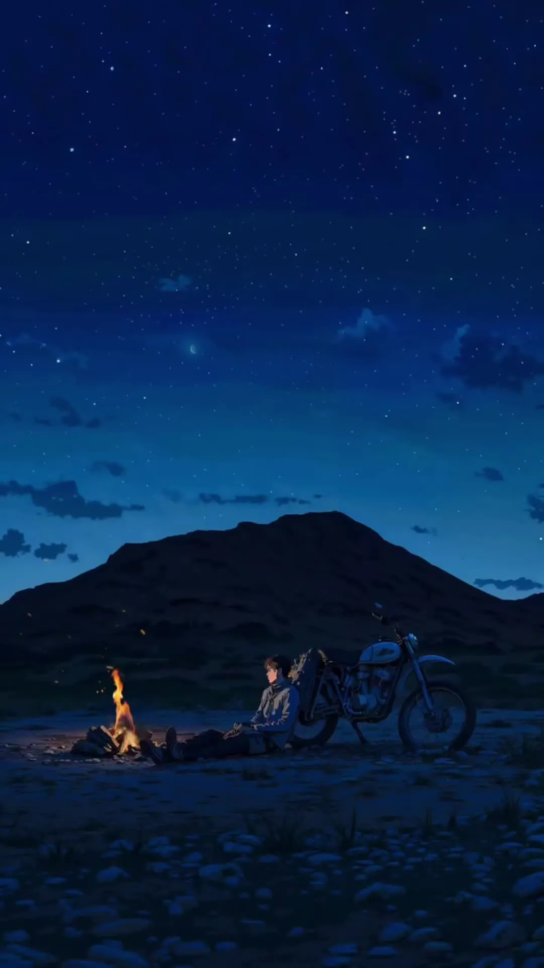 a motorcycle parked next to a campfire under a night sky with stars and clouds