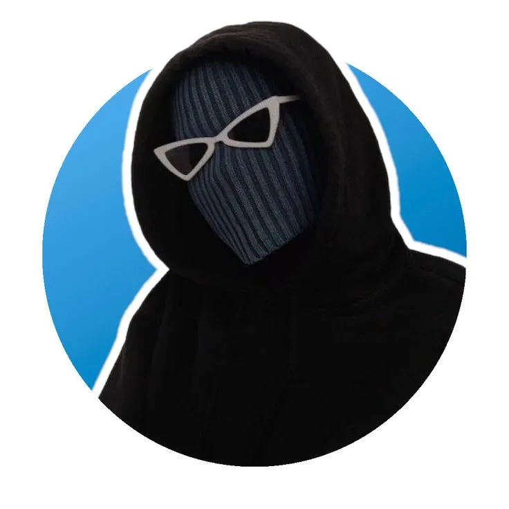a person in a black hoodie with glasses on their face and the image is circular