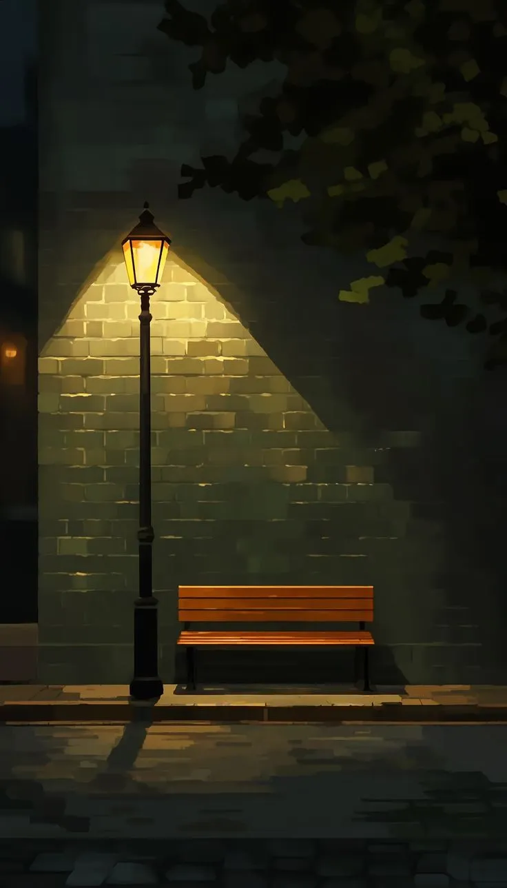 a bench sitting under a street light next to a brick wall