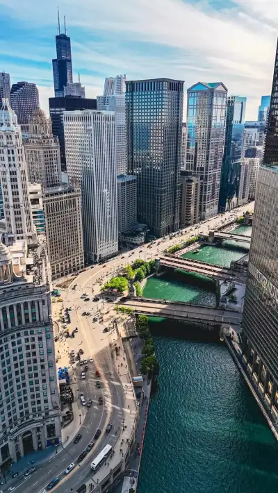 an aerial view of the chicago river and city buildings