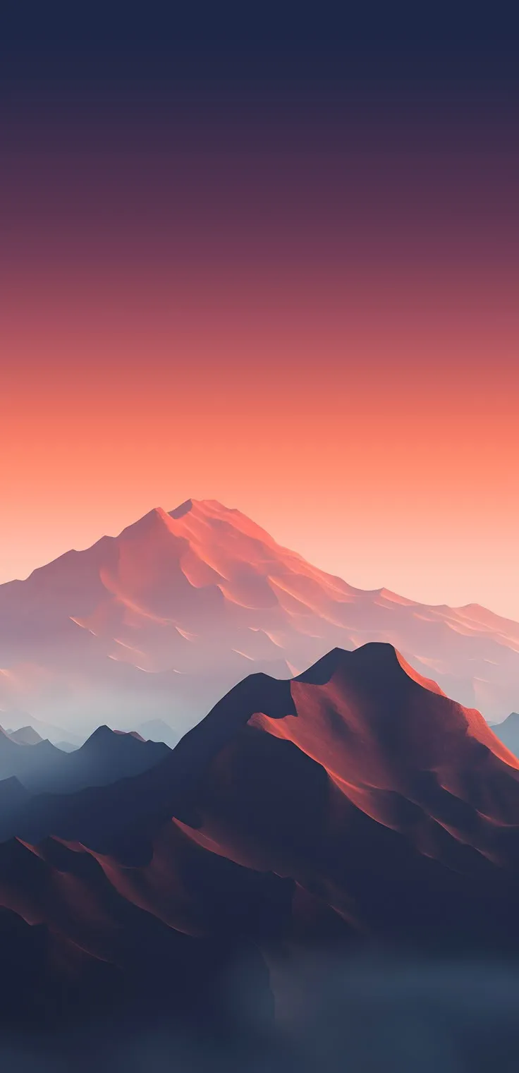 the mountains are covered in fog and pink hues at sunrise or sunset, as seen from an airplane