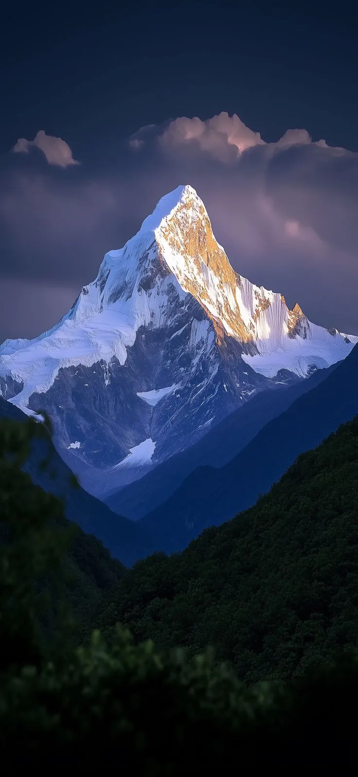a snow covered mountain with trees in the foreground and dark clouds in the background