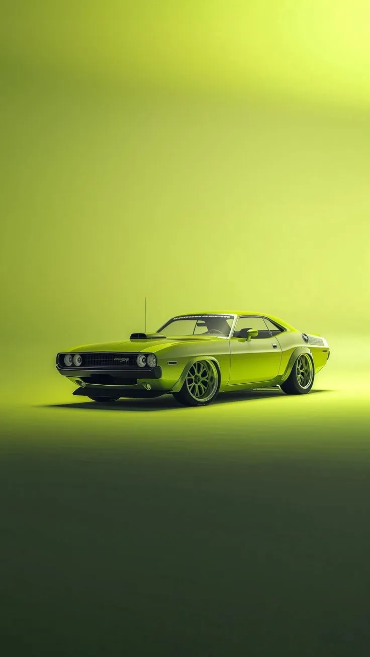 the green car is parked in front of a yellow background
