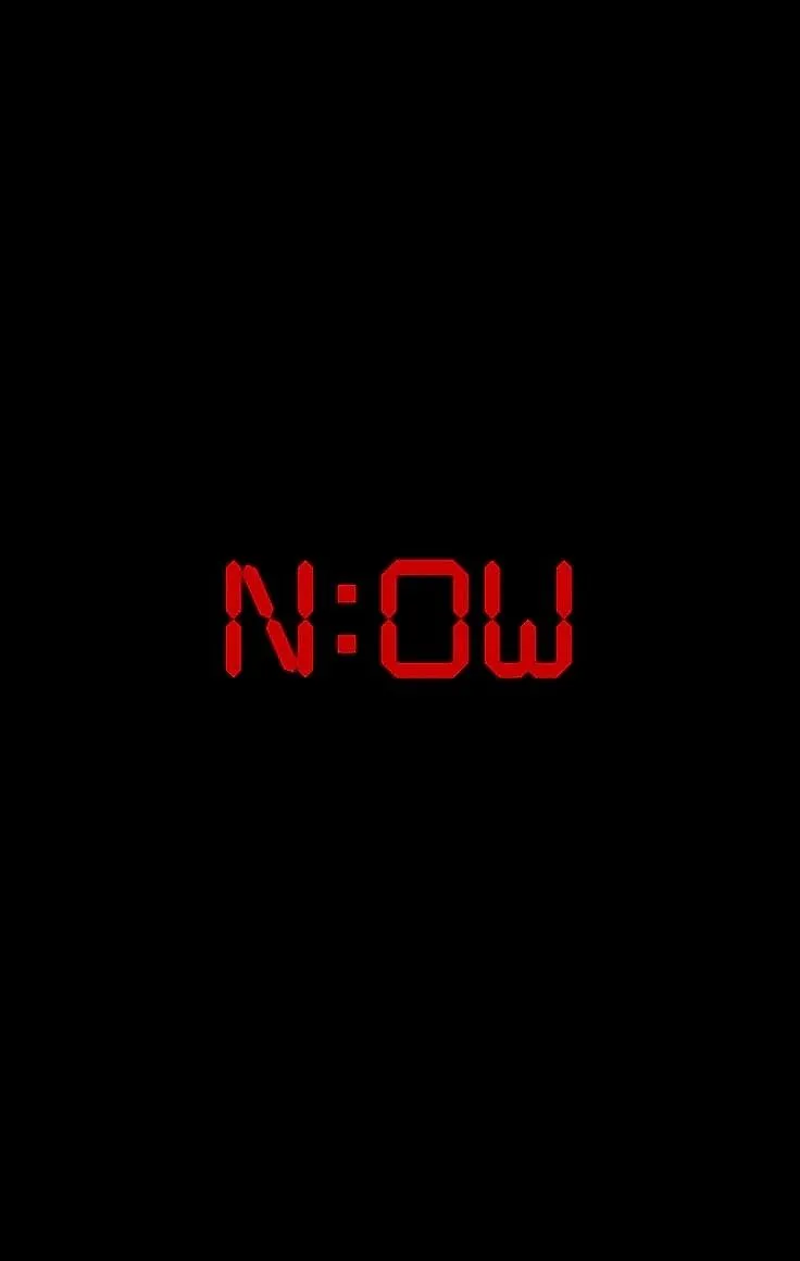 the word now written in red on a black background