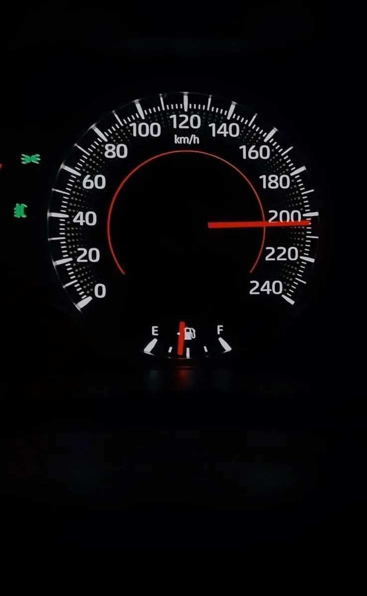 the speedometer is lit up in the dark