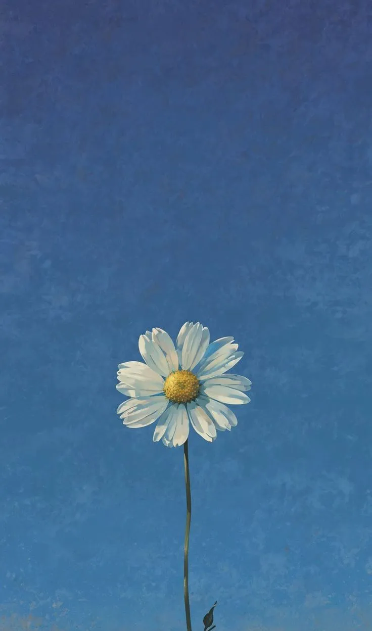 a single white flower is in the middle of a blue sky with clouds and grass