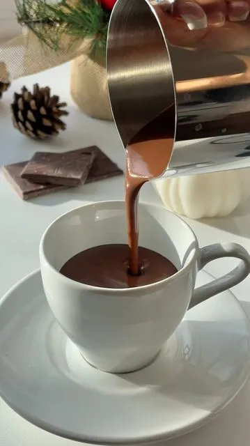 Tuyen 🌟 on Instagram: "making the tiktok viral thick french hot chocolate at home ☕️✨ tip: make sure your chocolate sits in your hot cream and milk mixture before returning to heat to make sure everything’s smooth! if you want it to be thicker, add i