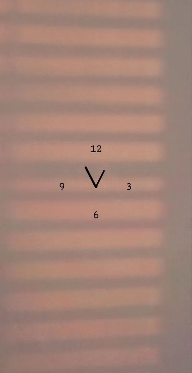 a clock with the time twelve o'clock on it