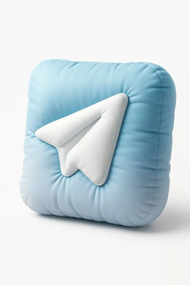 a blue pillow with an arrow on it's side and a white object in the middle